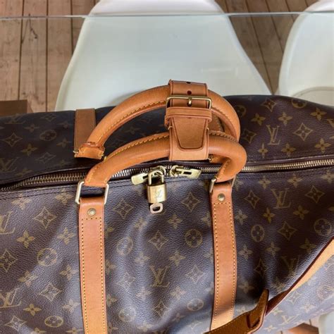 louis vuitton keepall leather|Louis Vuitton Keepall bandouliere.